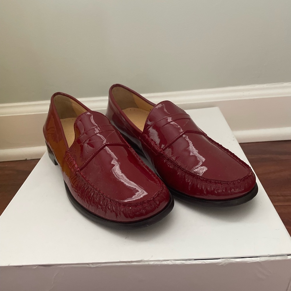 Cole Haan Burgundy red patent leather loafers.